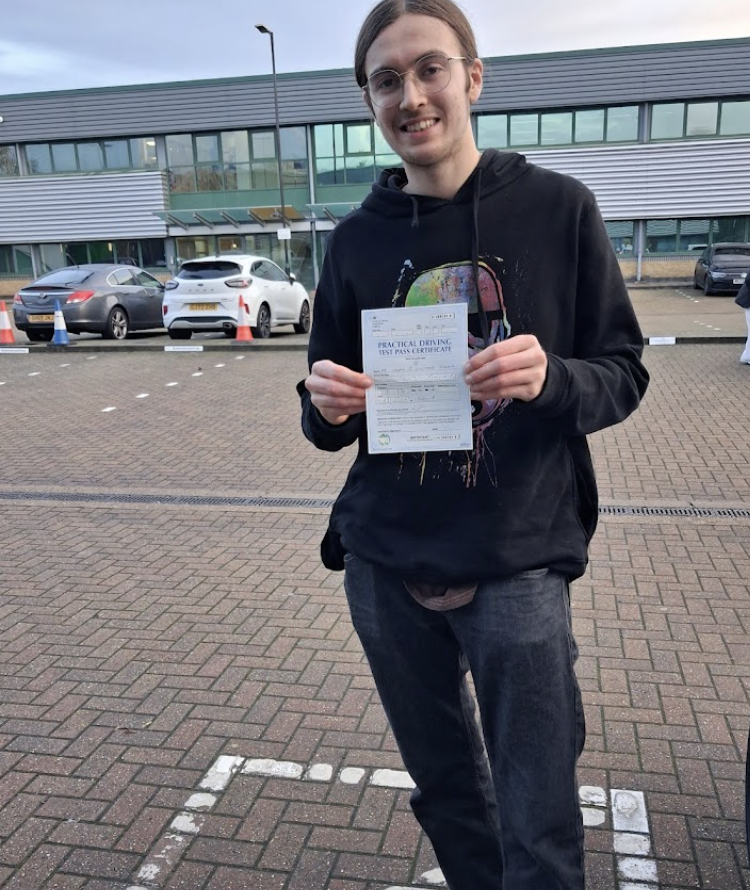 Student in glasses with pass certificate